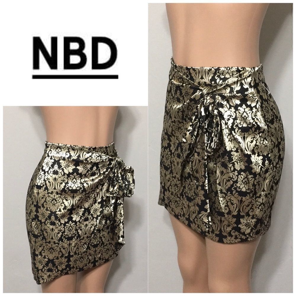 NBD gold and black high waisted faux wrap shirt.